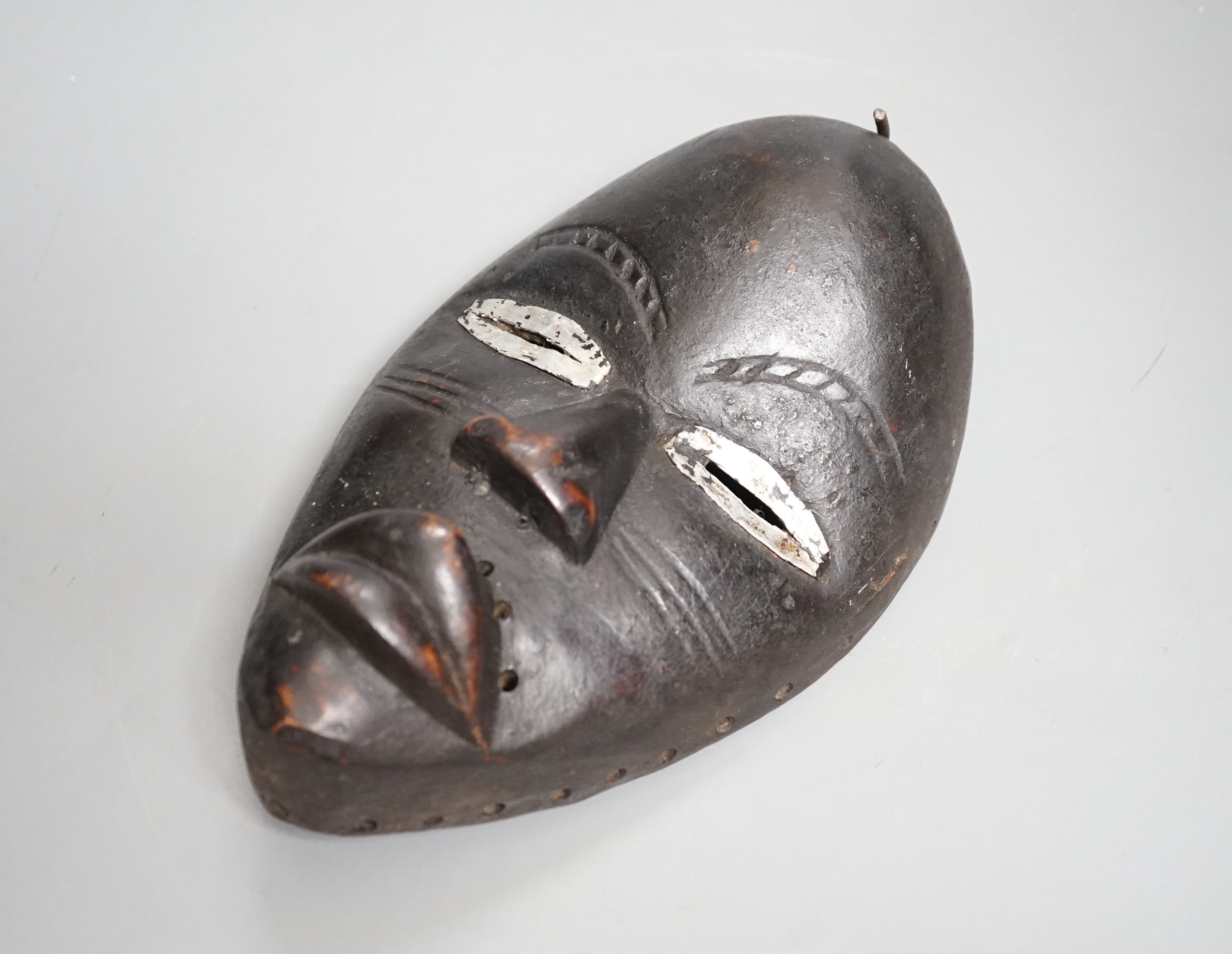 A Liberian Dan tribal mask (racing) 23cm